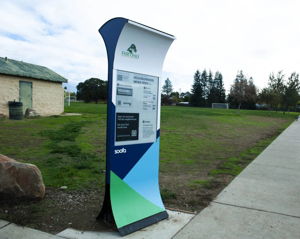 Outdoor digital bulletin board kiosk — community reader board at HOA park/amenity entrance (Metro Atlanta)