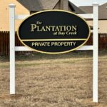 ABOUT The Plantation at Bay Creek HOA post-and-panel entrance sign in Marietta GA, Cobb County