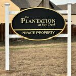 ABOUT The Plantation at Bay Creek HOA post-and-panel entrance sign in Marietta GA, Cobb County