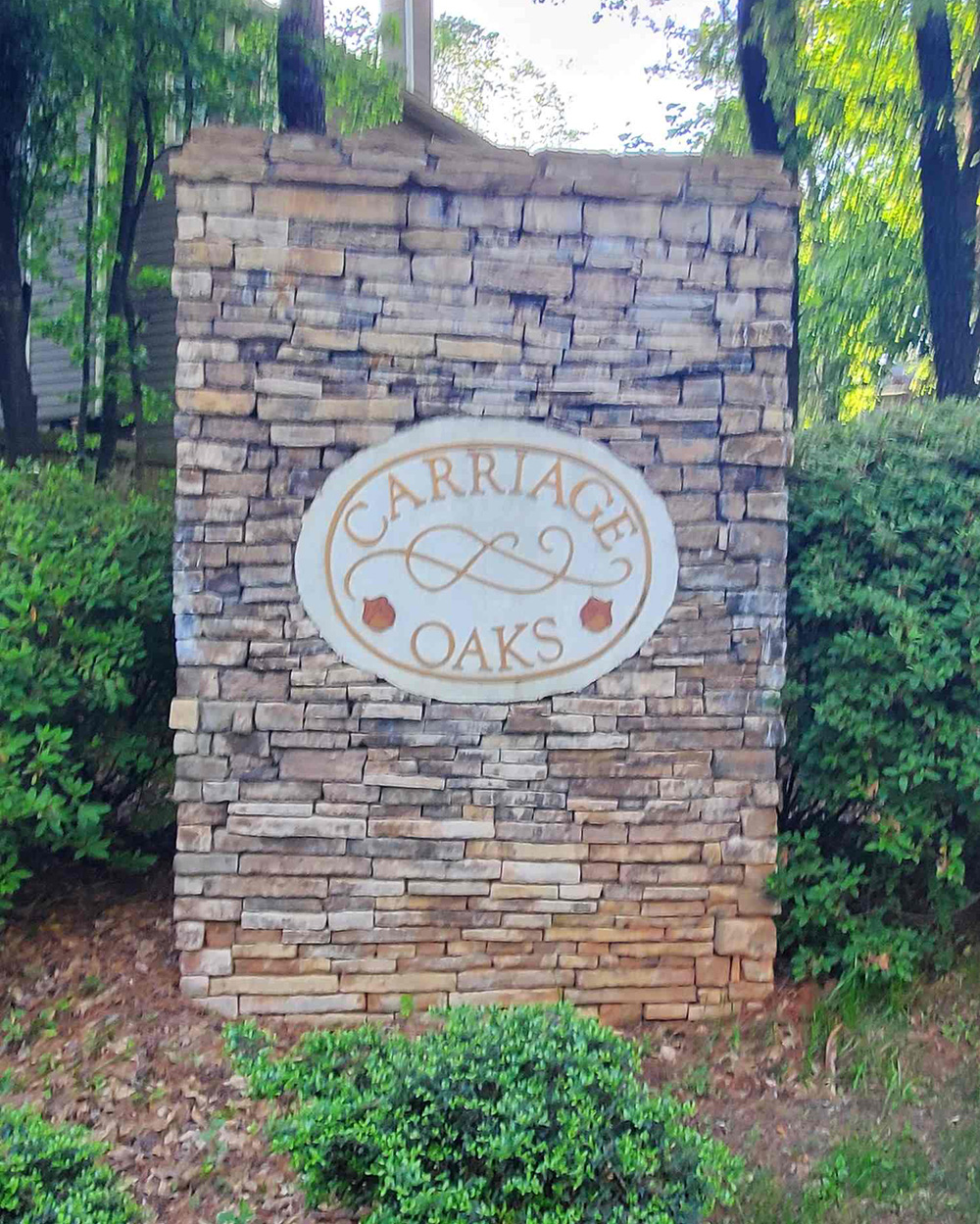 carriage oaks entrance monument sign stacked stone marietta ga
