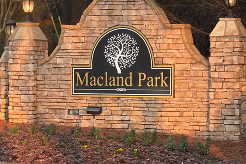 Macland Park subdivision monument sign with stacked stone entrance feature in Marietta, Georgia.