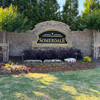 Neighborhood entry sign after restoration in Cumming, Georgia